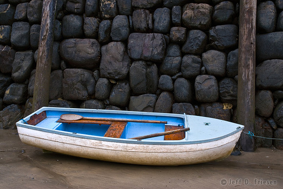 Rowboat and Rock Wall