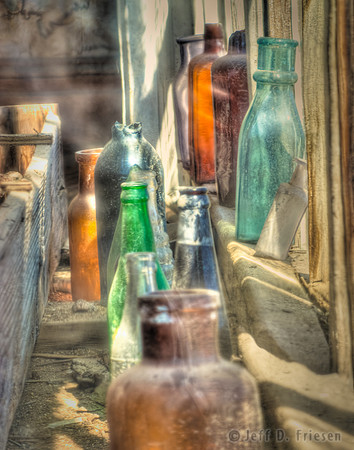 Bottles behind glass