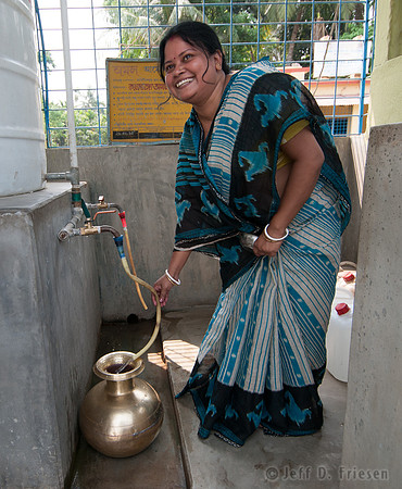 Woman Collects Water 1