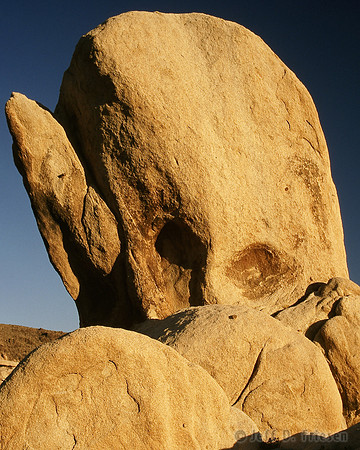 Breaching granite whale